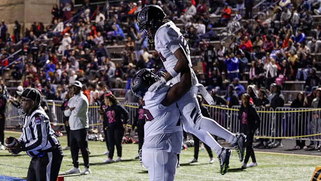 Cardinal Ritter's De'Shaun Stevenson celebrates a touchdown